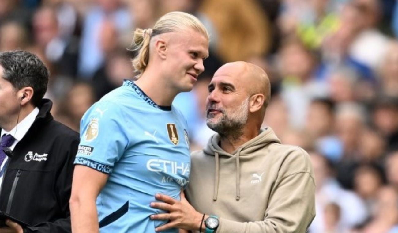 Pep Guardiola y Erling Haaland