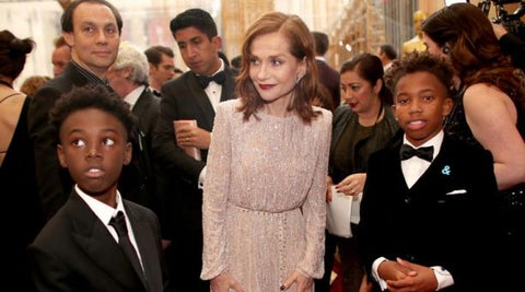 Isabelle-Huppert-Alex-R.-Hibbert-izq-y-Jaden-Piner-der-AFP.jpeg