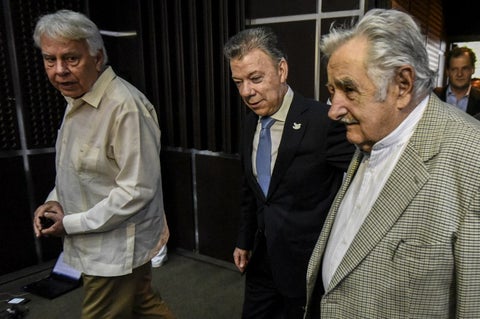 Santos-Gonzalez-Mujica-LA-FM-AFP.jpg