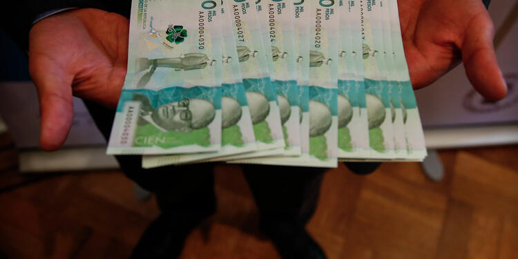 Billetes de 100 mil pesos colombianos