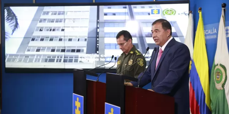Fiscal (e.) Fabio Espitia y el director de la Policía, general Óscar Atehortúa.