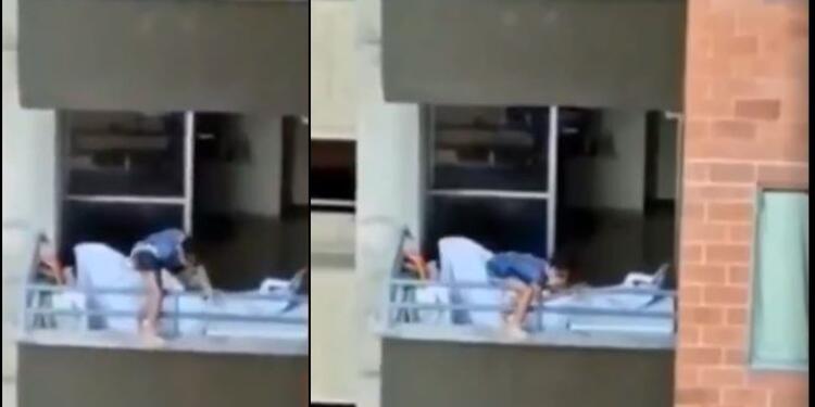 Niña peligrando al jugar en el balcón