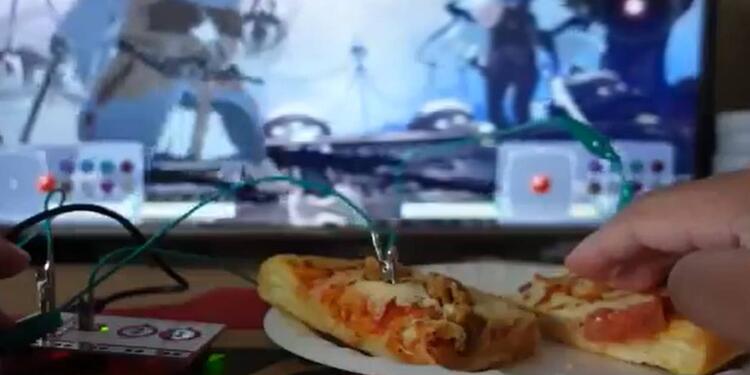 Convierten pizza en un mando