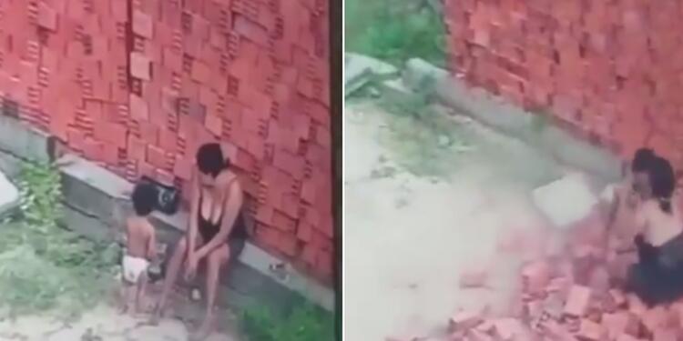 Mamá recibe la caída de un muro para salvar a su bebé
