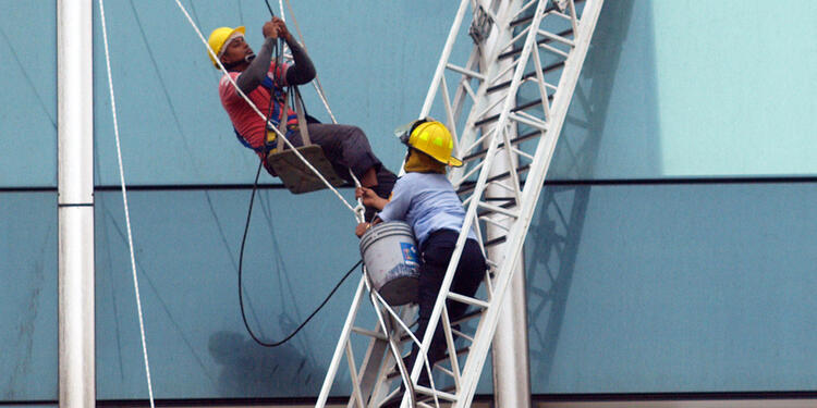 trabajadores en edificio trabajadores en edificio