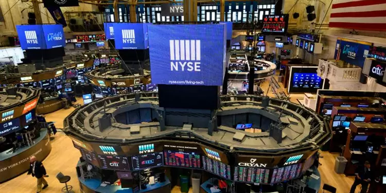 Corredores de bolsa en Wall Street