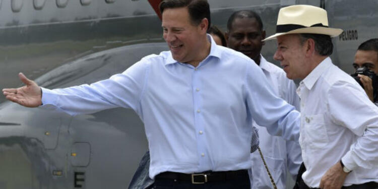Juan-CarlosVarelayJuanManuelSantosAFP.jpg
