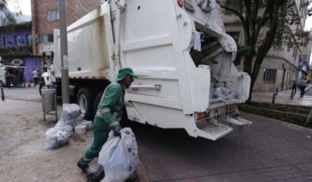 Recolectores de basuras en la ciudad Recolectores de basuras en la ciudad