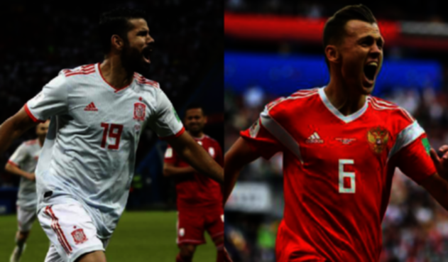 Diego Costa, delantero de España y Denis Cheryshev, volante de Rusia
