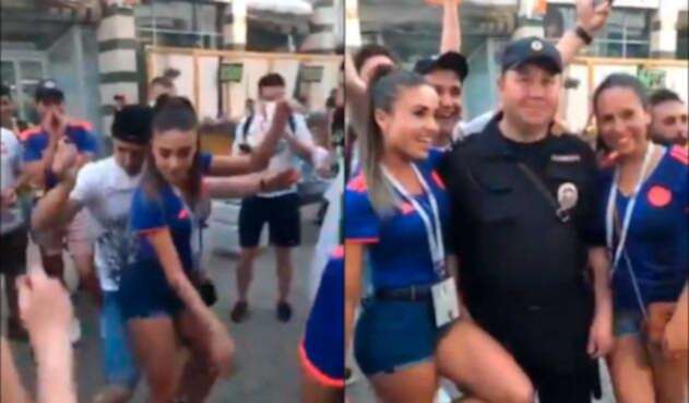Hinchas Colombia y policía ruso