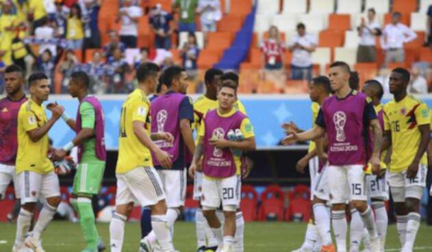 Jugadores de la Selección Colombia tras el partido ante Japón