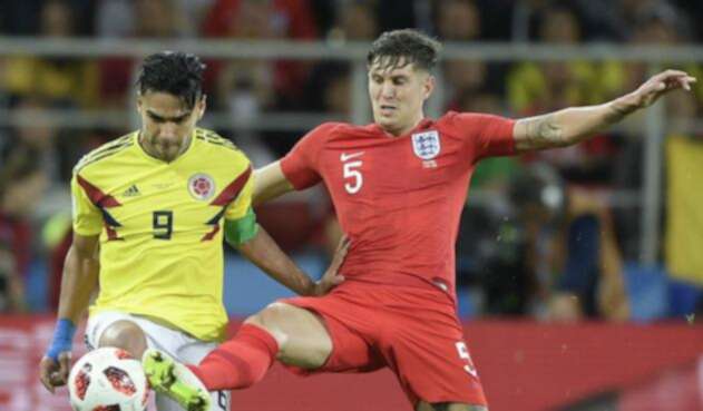 John Stones y Falcao