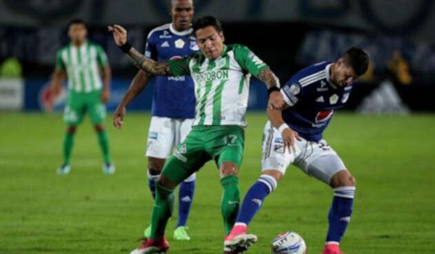 Dayro Moreno y Matías de los Santos en un duelo entre Nacional y Millonarios