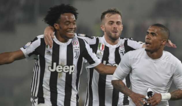 Juan Guillermo Cuadrado, Miralem Pjanic y Douglas Costa