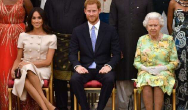 Reina Isabel II, príncipe Harry y Meghan Markle