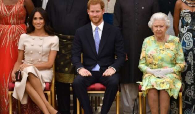 Reina Isabel II, príncipe Harry y Meghan Markle