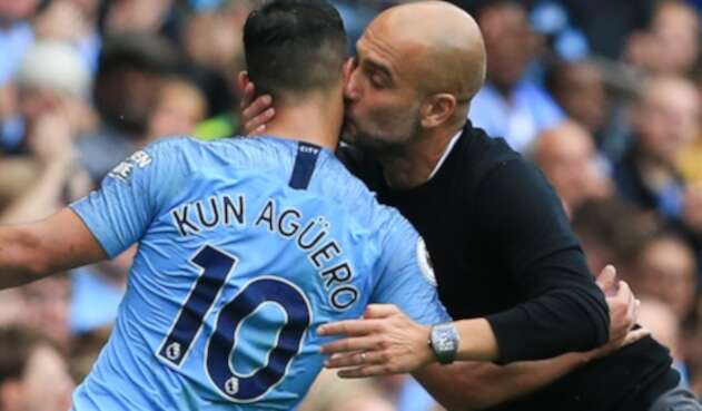 Sergio Agüero y Pep Guardiola