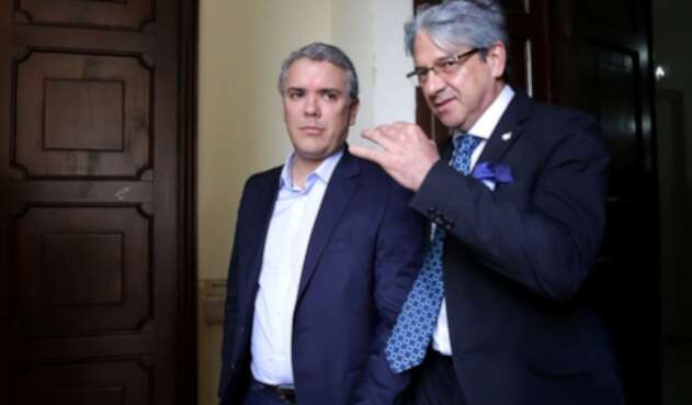 Iván Duque junto al consejero Jaime Amín.