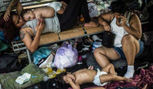 Niños caravana migrantes hondureños