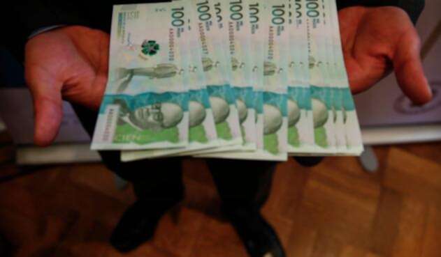Billetes de 100 mil pesos colombianos