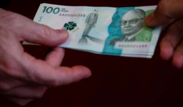 Billetes de 100 mil pesos colombianos