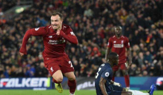 Xherdan Shaqiri (Liverppol) celebrando uno de sus tantos ante Manchester United, en Anfield