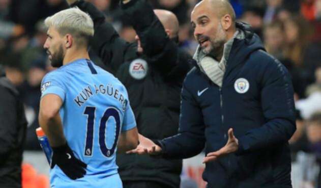 Sergio Agüero y Josep Guardiola