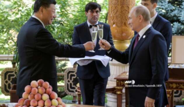 Vladimir Putin y Xi Junping
