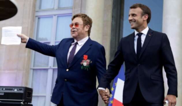 Elton John y Emmanuel Macron se unen contra el sida en París Elton John y Emmanuel Macron se unen contra el sida en París