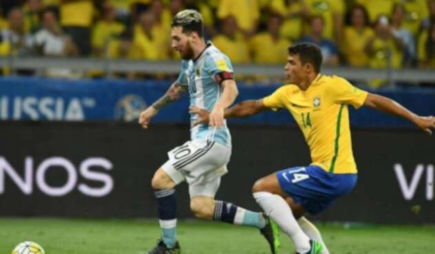 Messi y Thiago Silva