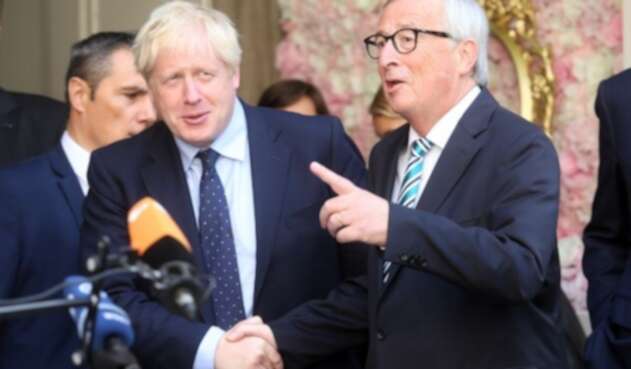 Primer ministro británico, Boris Johnson, con el presidente de la Comisión Europea, Jean-Claude Juncker