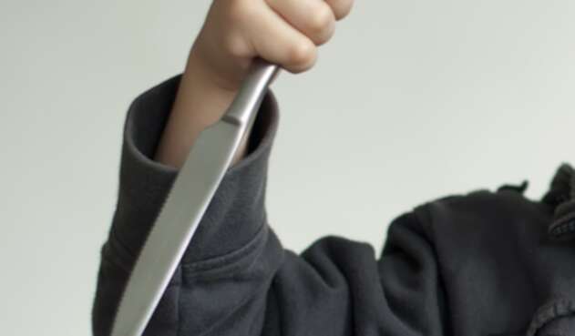Niño con cuchillo