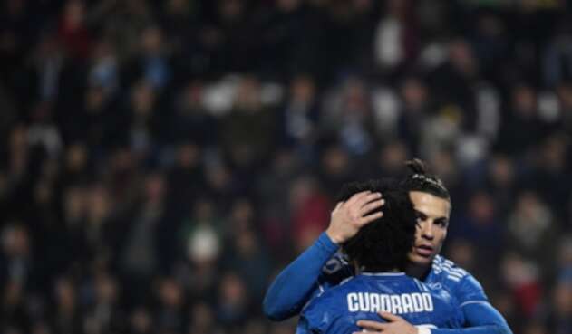 Juan Guillermo Cuadrado y Cristiano Ronaldo Juan Guillermo Cuadrado y Cristiano Ronaldo