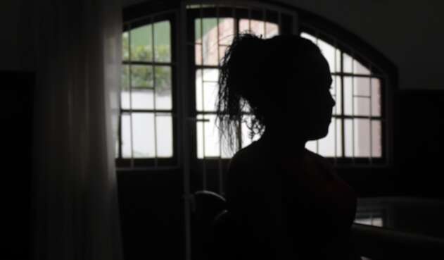 Mujer en el barrio Santa Fe, en Bogotá
