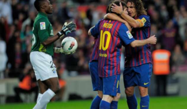 Puyol y Messi juntos en el Barcelona (2012) Puyol y Messi juntos en el Barcelona (2012)