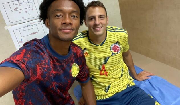 Juan Guillermo Cuadrado y Santiago Arias