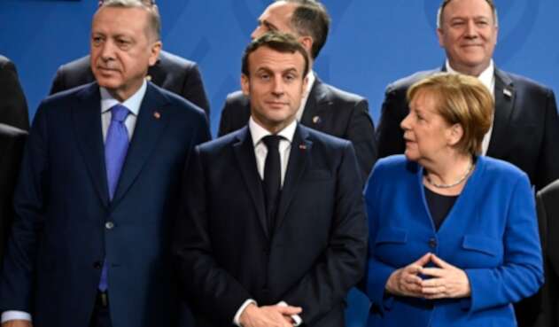 Recep Tayyip Erdogan, Emmanuel Macron y Angela Merkel