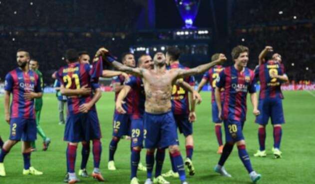 AlvesChampionsBarcelonaAFP1.jpg