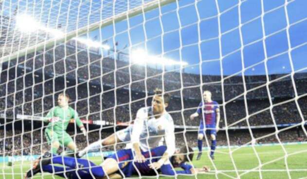 CristianovsPiqueClasicoAFP.jpg