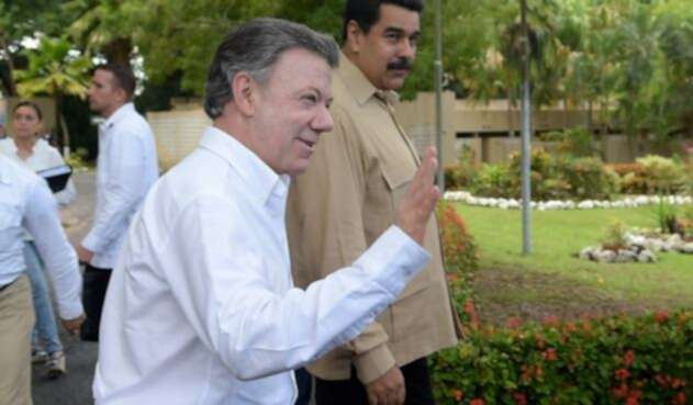 juanmanuelsantosnicolasmadurocolprensa.jpg