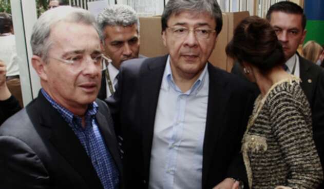 uribeycarlosholmestrujillocolprensa.jpg