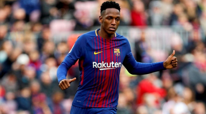 Yerry Mina jugando con el Barcelona