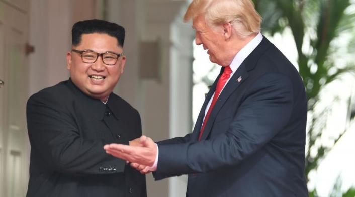Kim Jong-un y Donald Trump.