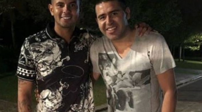 Edwin Cardona y Juan Román Riquelme