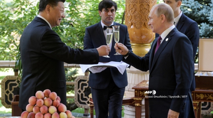 Vladimir Putin y Xi Junping