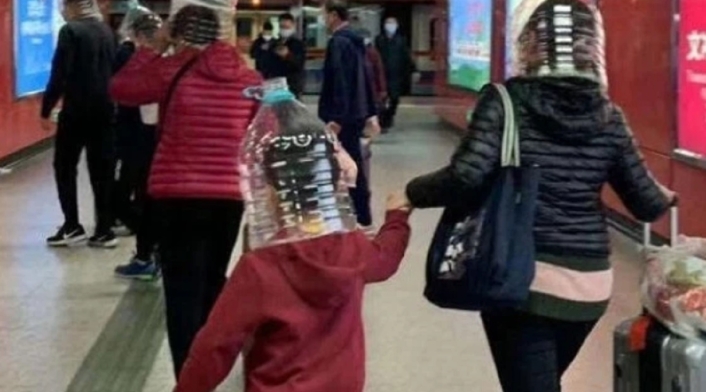 Improvisadas tácticas de los chinos para evitar el coronavirus