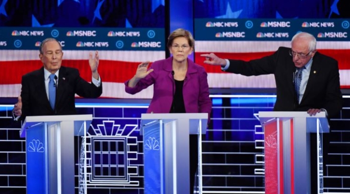 Michael Bloomberg, Elizabeth Warren y Bernie Sanders