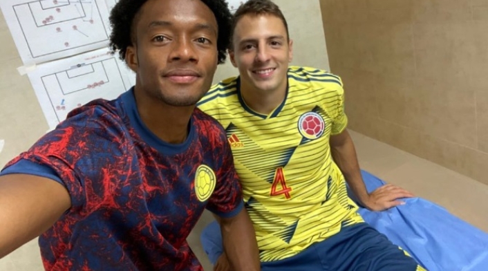 Juan Guillermo Cuadrado y Santiago Arias