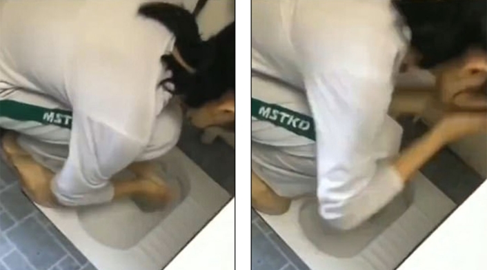 Entrenador chino obliga a niños a lavarse con agua del inodoro Entrenador chino obliga a niños a lavarse con agua del inodoro