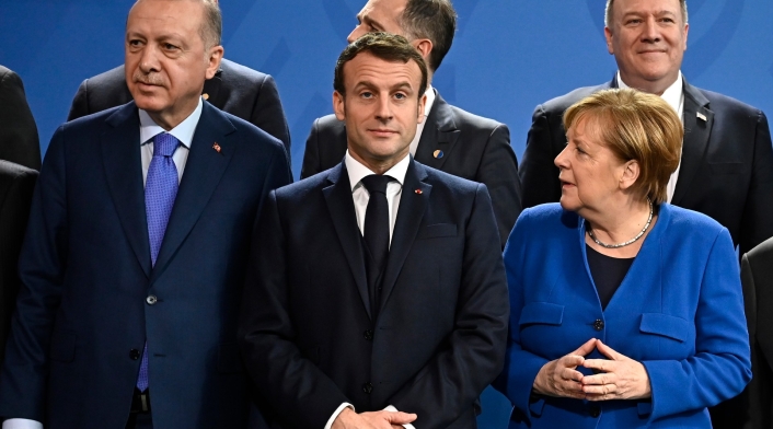 Recep Tayyip Erdogan, Emmanuel Macron y Angela Merkel